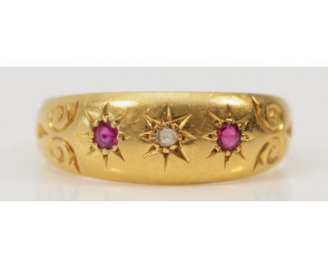 A 9ct gold vintage bezel set ruby and diamond trilogy dress ring, R, 2.8g 