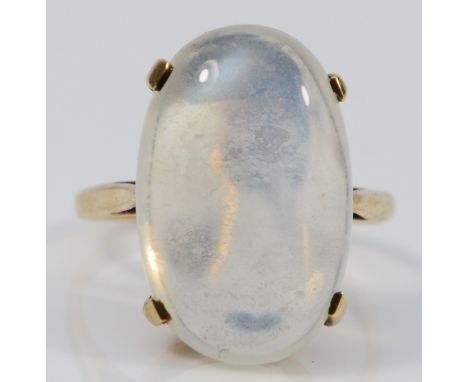 A 9ct gold and cabochon moonstone ring, stone 17 x 11mm, J 1/2, 3.5gm 