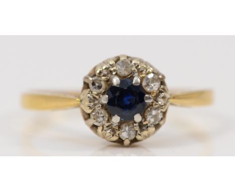 An 18ct gold vintage sapphire and diamond halo dress ring, N, 1.9g 