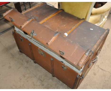 A large Vintage wood and steel bound travelling case, length 83cm with a 3 drawer fitted interior.