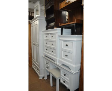 A modern white 6-piece bedroom suite to include a 2-door wardrobe, dressing table with mirror and stool, 4-drawer chest and a