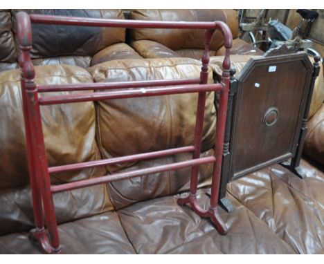 A painted pine towel rail and a panelled oak firescreen.