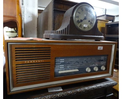 A Ferranti radio and an oak 2-train mantel clock.