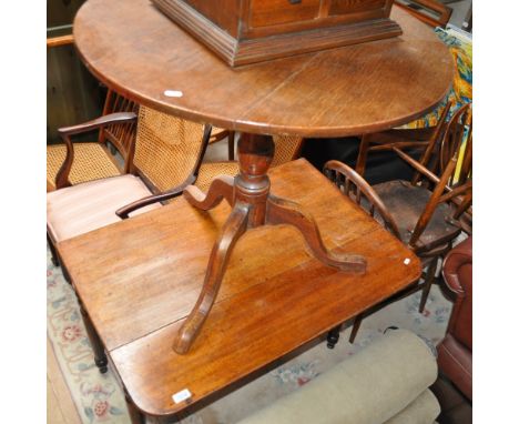 A Georgian oak tilt top tripod table and a Georgian mahogany Pembroke table.