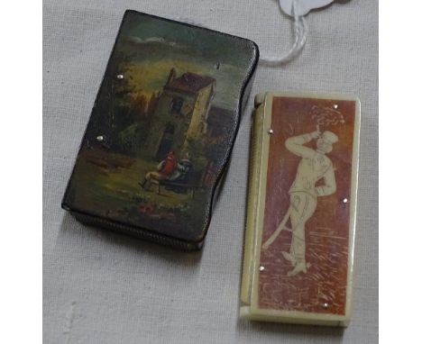 A Victorian papier-mache snuff box with painted lid, length 5cm and a bone vesta case, (2).