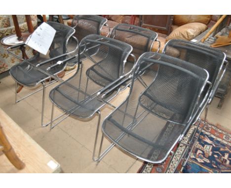 A set of 6 Charles Pollock "Penelope" armchairs in chrome steel and black mesh by Castelli, Italy.