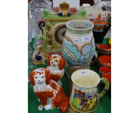 A Carltonware vase, clock, pair of mantel spaniels and a Crown Devon musical mug.