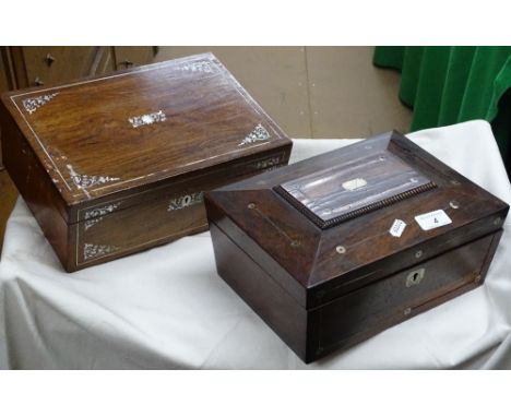 A Victorian rosewood work box with mother of pearl inlay and fitted interior and another.