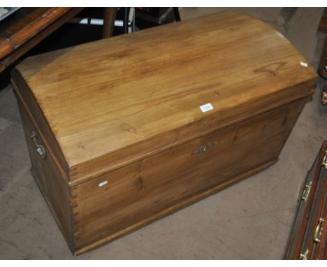 A continental pine domed top trunk, length 89cm.