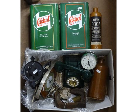 Scale, clocks, telephone and 2 Castrol Oil cans.