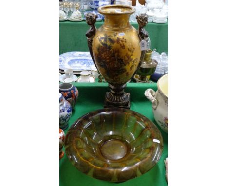 An Art Deco amber cloud glass table centre dish on separate stand and a vase with figure handles.