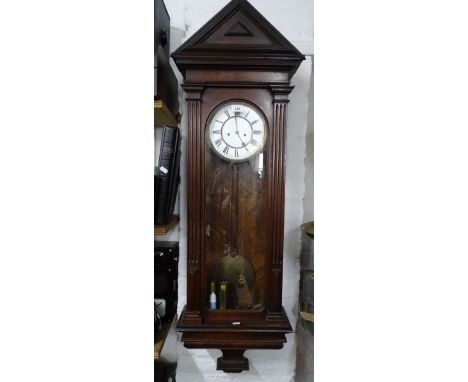 A mahogany cased Vienna wall clock.