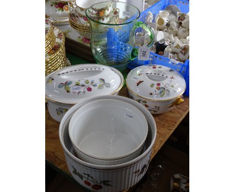 Royal Worcester souffle dishes and casseroles and a green glass jug.