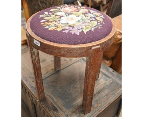 Art Deco limed oak circular stool with tapestry seat, width 42cm.