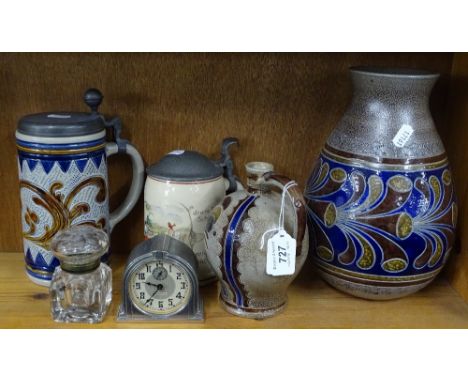 Cut-glass inkwell, clock, German biersteins and vases.