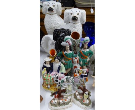 Pair of Staffordshire mantel spaniels, a pair of black glazed gilded spaniels, and various Staffordshire figures.