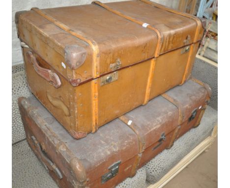 A Vintage leather bound trunk with fitted tray, leather handles and another.
