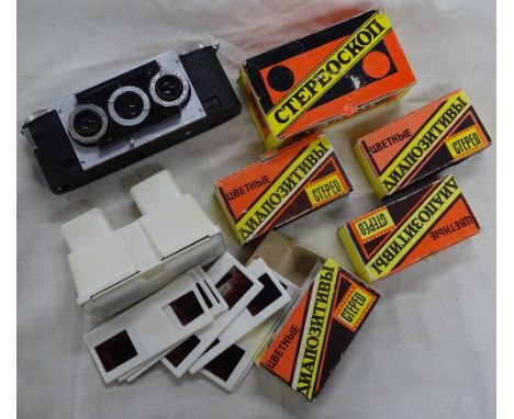 A Stereoviewer and sets of slides, and a camera.