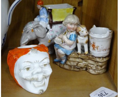 3 19th century ceramic match strikers, including an elephant figure, length 12cm, (3).