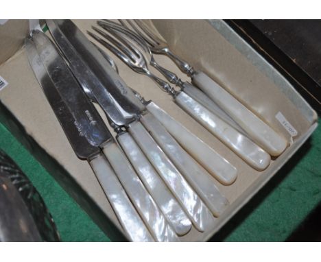 Set of 6 silver bladed and mother of pearl handled knives and 5 matching forks
