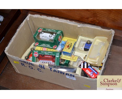 A box of various boxed die-cast vehicles to include Corgi
