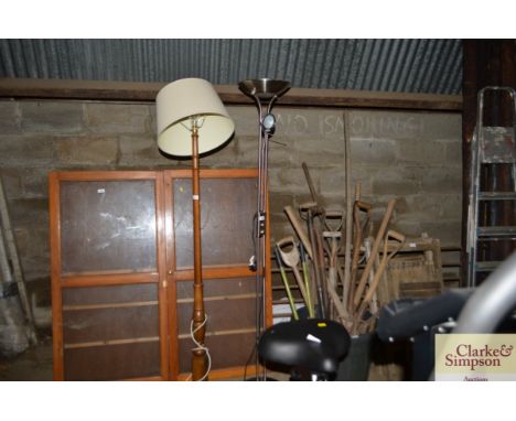 A modern uplighter with adjustable reading lamp 
