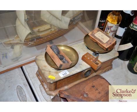 A vintage set of balance scales and weights 