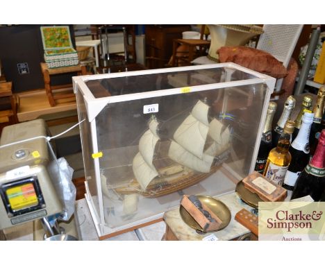 A model ship in display case
