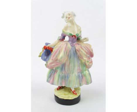 Royal Doulton 'The Belle' HN 754 (model 477) designed by Leslie Harradine, withdrawn 1938. 16.5cm in Height. Stamped and Hand