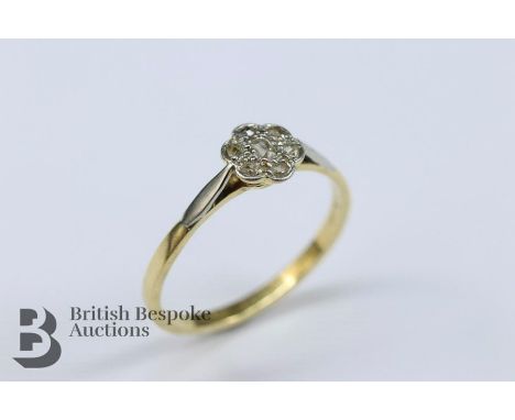 An 18ct gold, platinum and diamond ring, size R,&nbsp; set with 18 pts of rose-cut dias and one old-cut diamond of 4 pts, app