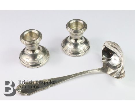 Pair of silver travelling candlesticks, stamped 925 Birmingham hallmark dated 2007, mm STD and a Scandinavian ladle, mm SJ ap