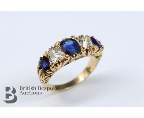 Antique 18ct royal blue sapphire and diamond ring, the ring set with a midnight blue emerald-cut sapphire approx 6.65 x 5mm a