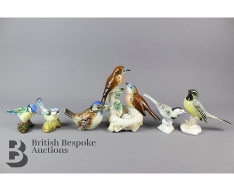 Six porcelain birds including a Crown Staffordshire tom tit by J. T. Jones approx 7cms and another similar Crown Staffordshir