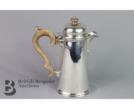 An Edwardian Mappin &amp; Webb chocolate pot, marks rubbed, fruitwood handle and finial, approx 19 cms h, approx 354 gms.