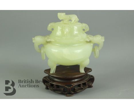 Chinese celadon jade censer and cover, elephantine ring handles, the cover with salamander finial, approx 12.5 cms, presented