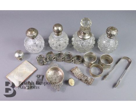 Collection of silver including three silver napkin rings, Victorian sugar tongs London hallmark dated 1865 mm SW, silver tea 