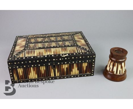 Sri Lankan porcupine quill trinket box, approx 22 x 16 x 7 cms, minor losses to box together with a candlestick of similar de
