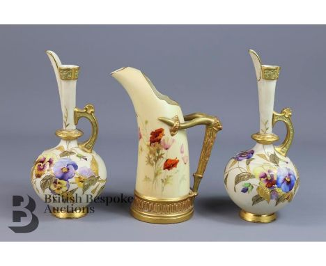 Royal Worcester vases, both painted with pansies and gilt enamel leaves and accents, green factory marks, approx 20cms height