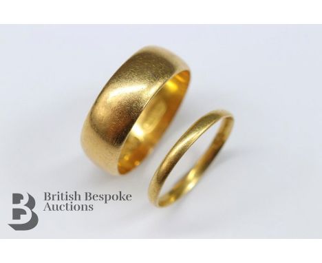 Two 22ct wedding bands, size N and size J respectively, gross weight 7.4 gms. Note: the size N ring is slightly misshapen. 