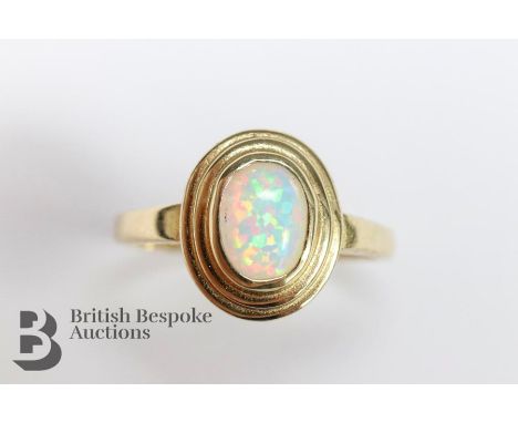 9ct gold opal ring, size O+, approx 2.63 gms, the opal measures 6 x 4mm, mm JMJ.