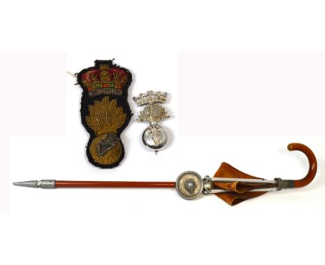 A mid 20th century Swaine-Brigg hallmarked silver mounted shooting stick with silver plaque inscribed 'Presented to Captain J