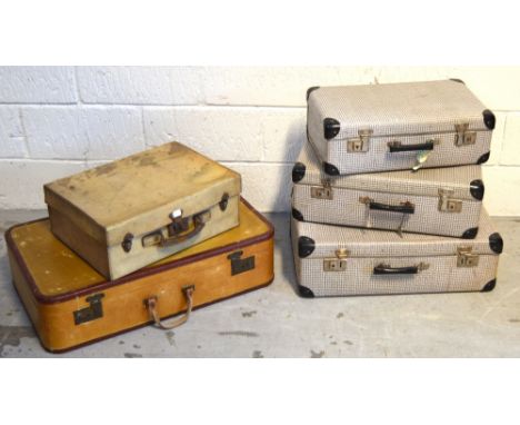 A set of three vintage graduating suitcases, a John Bagshaw & Sons of Liverpool pale yellow leather covered suitcase, and a f