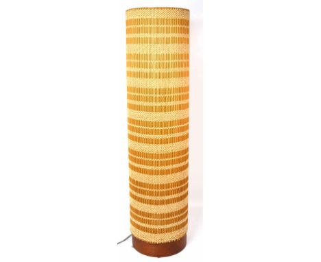 A 1970s retro  floor standing cylinder lamp with wooden base, height 81cm.