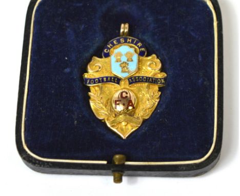 A boxed 9ct gold and enamel Cheshire Football Association amateur cup winners medal 1937-38, the revers marked I.C.I. (ALKILI