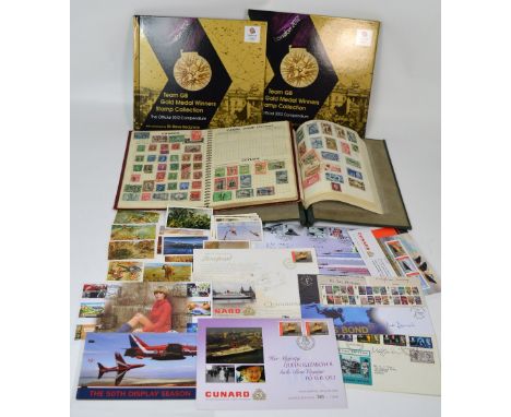 A quantity of British and world stamps and first day covers contained within two albums and loose some relating to the Isle o