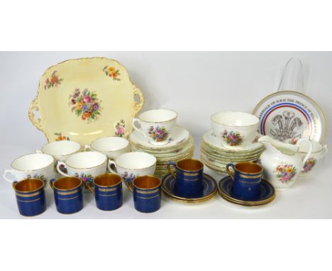 A set of six Wedgwood blue ground and gilt heightened coffee cans and saucers, a part Coalport 'Fragrance' pattern tea servic