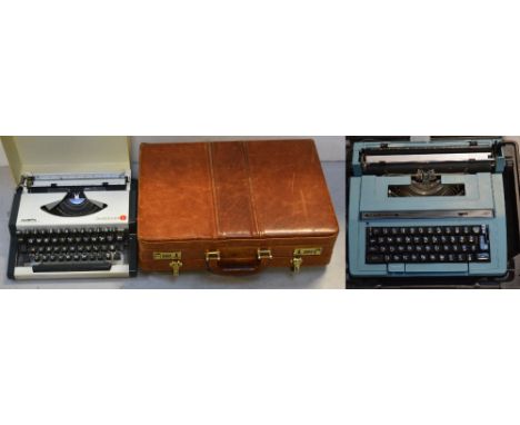 Two vintage cased typewriters and a vintage leather briefcase (3).