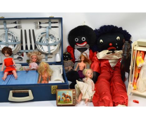 Two large soft golly dolls, an earlier smaller similar handmade doll, modern Barbie dolls and Sindy dolls house furniture to 