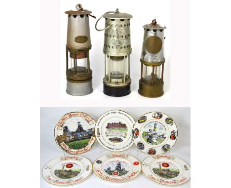 Three vintage miners lamps of various sizes and six collectors plates commemorating collieries; Sutton Manor Colliery 1906-19