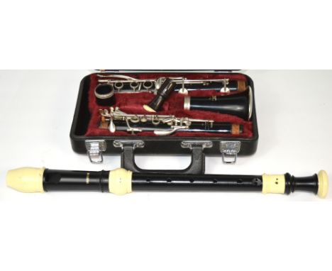 A Suzuki recorder and a cased Yamaha clarinet, cone section missing (2). CONDITION REPORT Clarinet model C100.